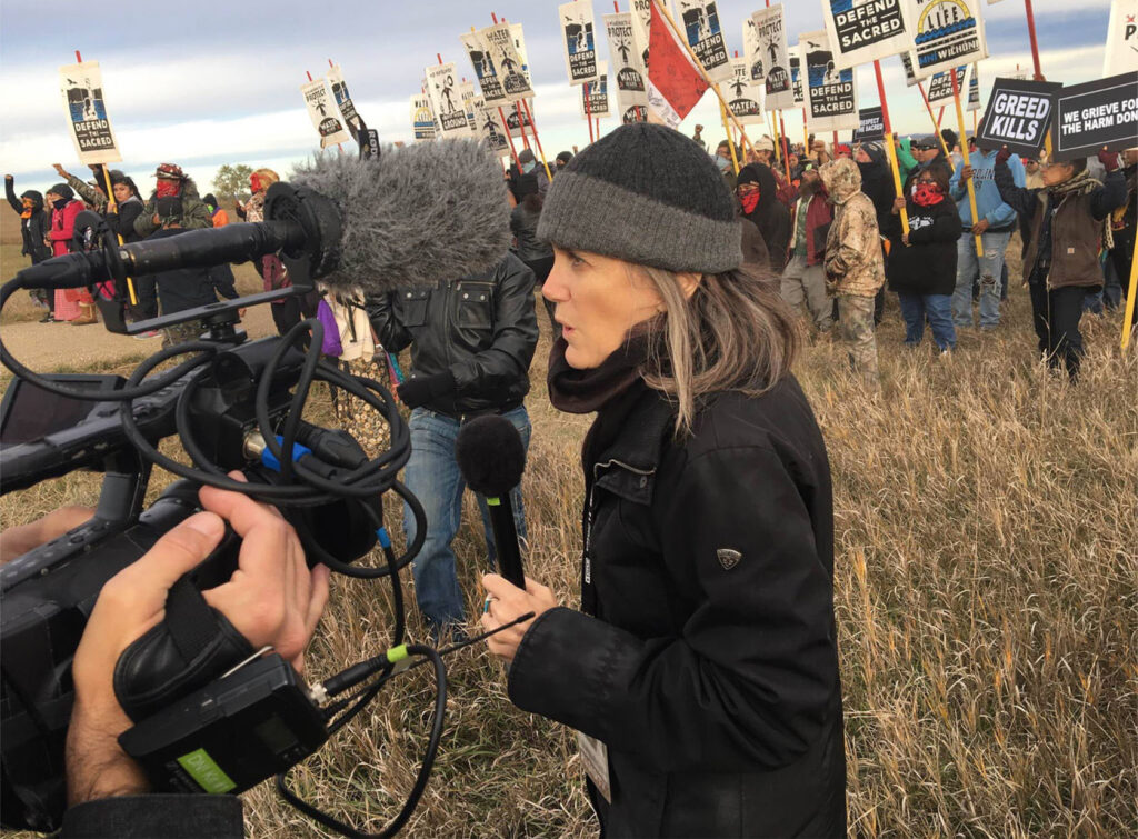 Amy Goodman covering the Standing Rock oil pipeline protest, October 2016. (courtesy of Reed Brody)Reporting from Standing Rock: Amy Goodman covering the Standing Rock oil pipeline protest, October 2016